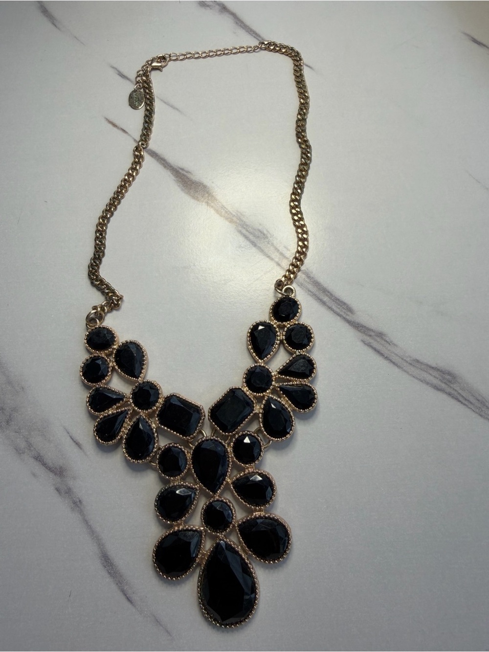 Gold-Tone Black Bib Necklace with Faceted Stones